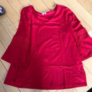 Red trumpet sleeve top